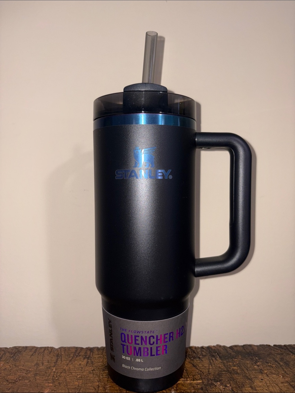 Stanley Black Tumbler with Blue Accents and Clear Straw